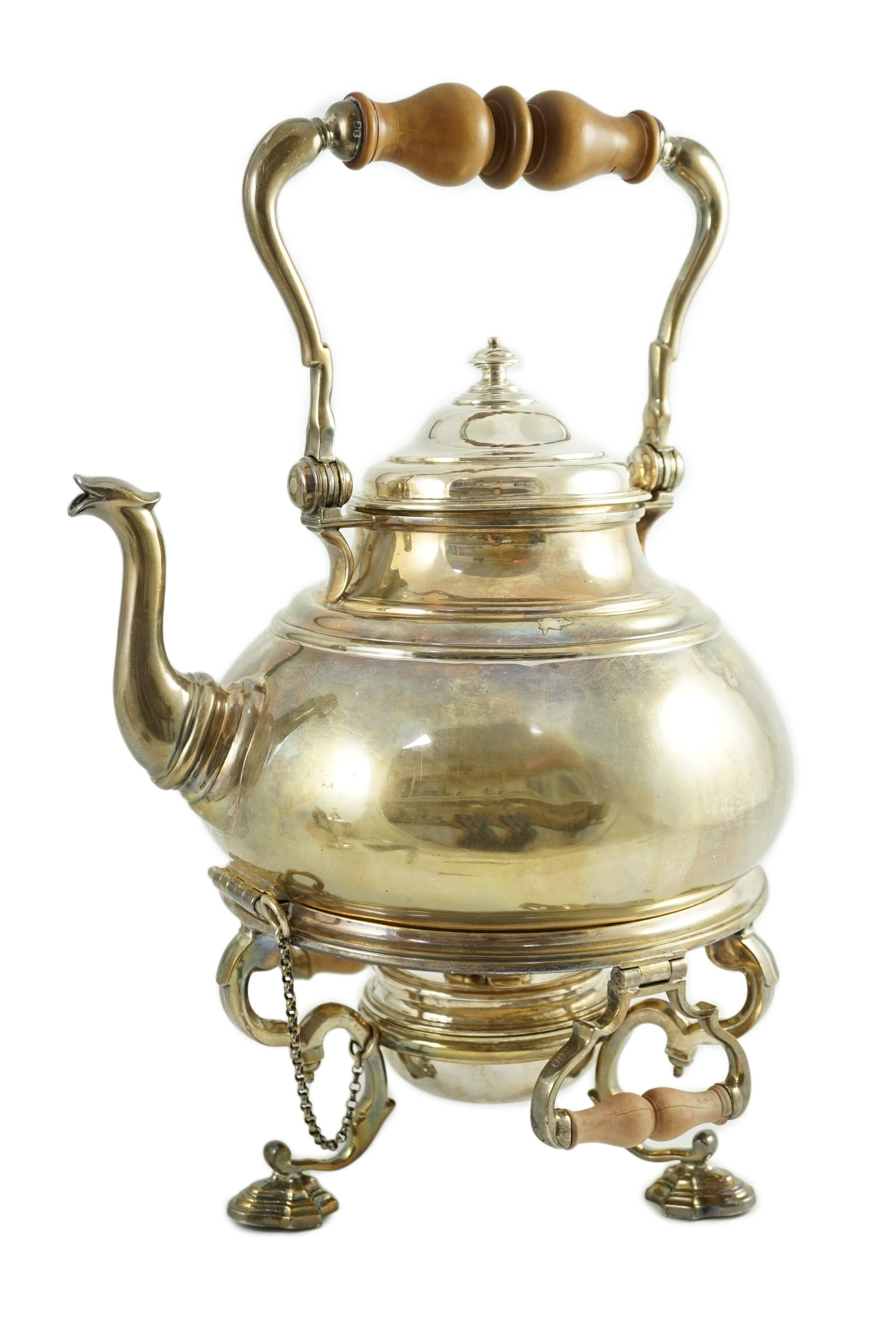 A large George V Britannia standard silver tea kettle on two handled stand, with burner, by Charles & Richard Comyns
